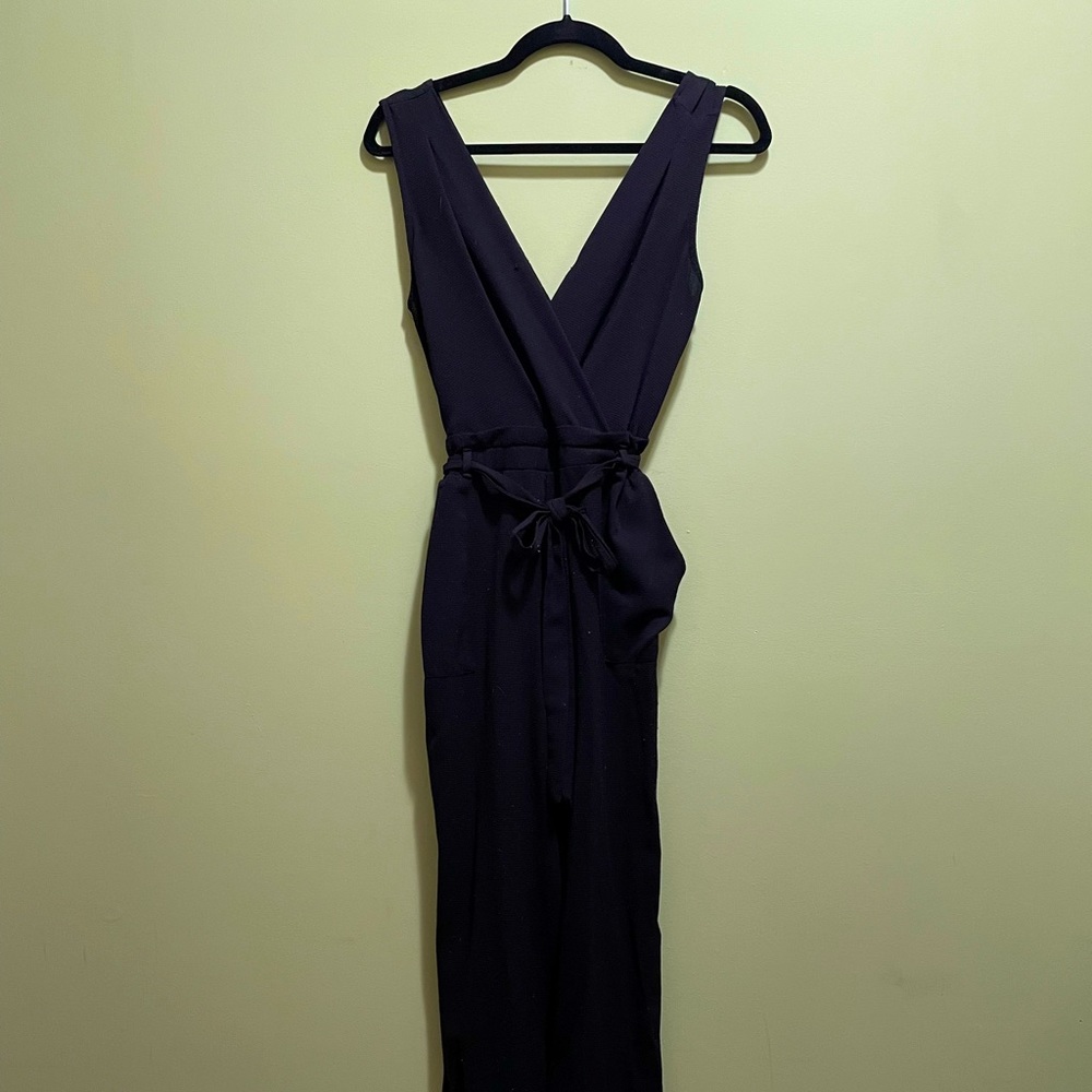 Black jumpsuit from Ross. Pants have splits on the sides. Size S